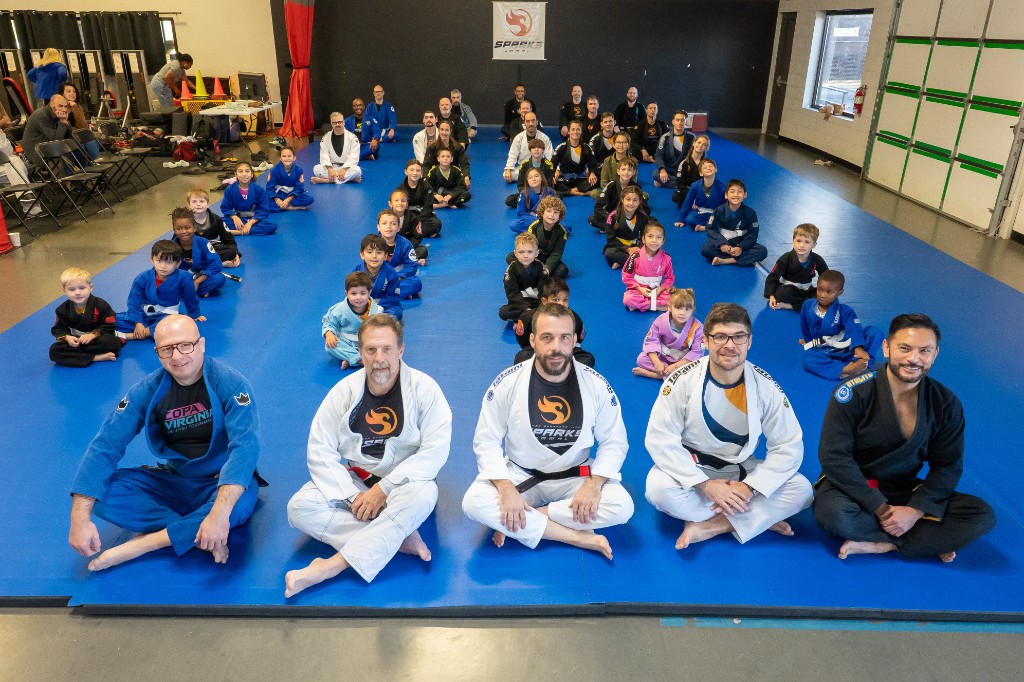 Whole group photo on the mats at Sparks MMA